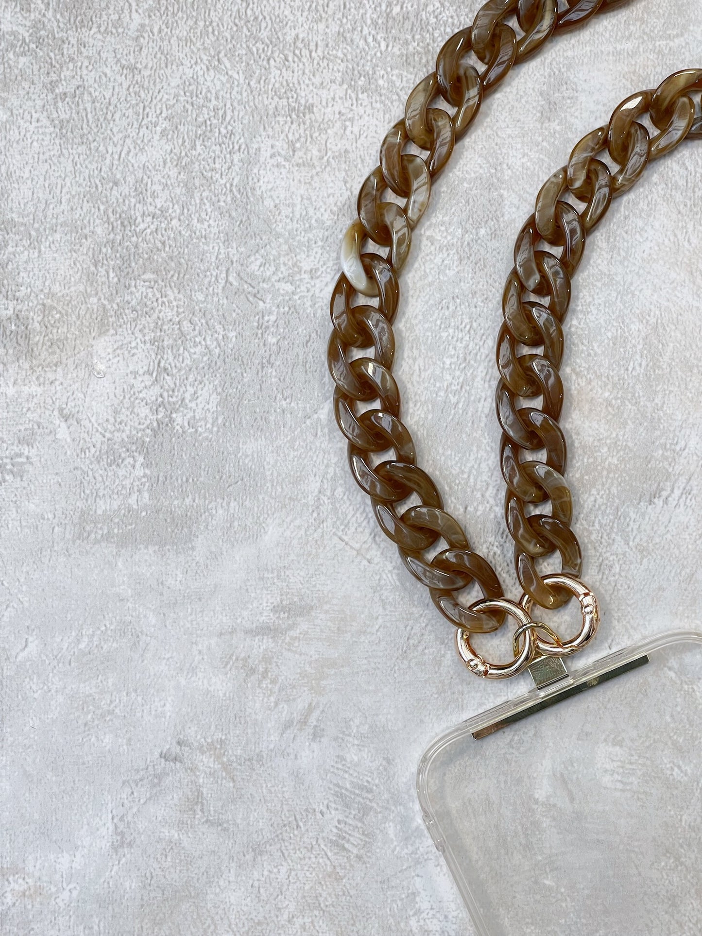 Our Phone Strap works with most phone cases —no need to replace yours
Our micro LynkyLynk phone straps are made with the same high quality LynkyLynk materials, but in a more petite size - each lynk is approximately half the size of a standard one; the overall length of the phone strap remains the same - for a more subtle phone accessory
Hands-free convenience, perfect for busy lifestyles
Available in countless colours and designs to personalise your look
Made with love in the UK